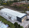 Edificio de fábrica de estructura de acero en Uruguay con oficina en entrepiso parcial